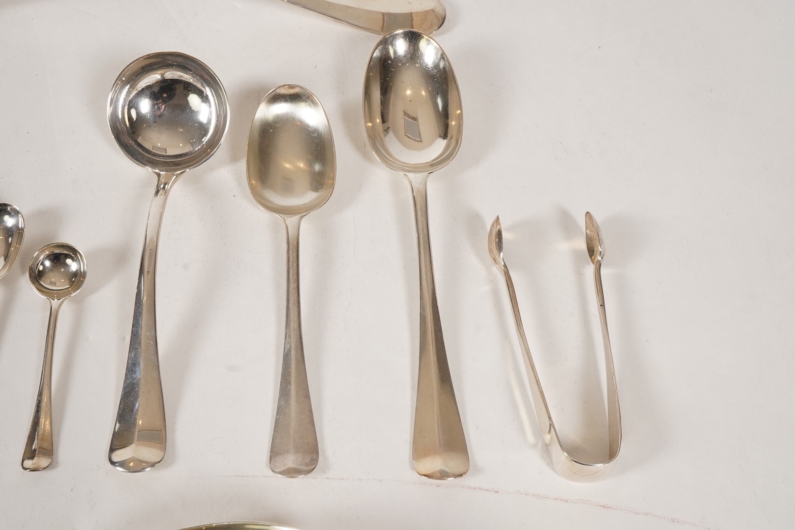 A George V canteen of silver Hanoverian rat tail flatware, by Mappin & Webb